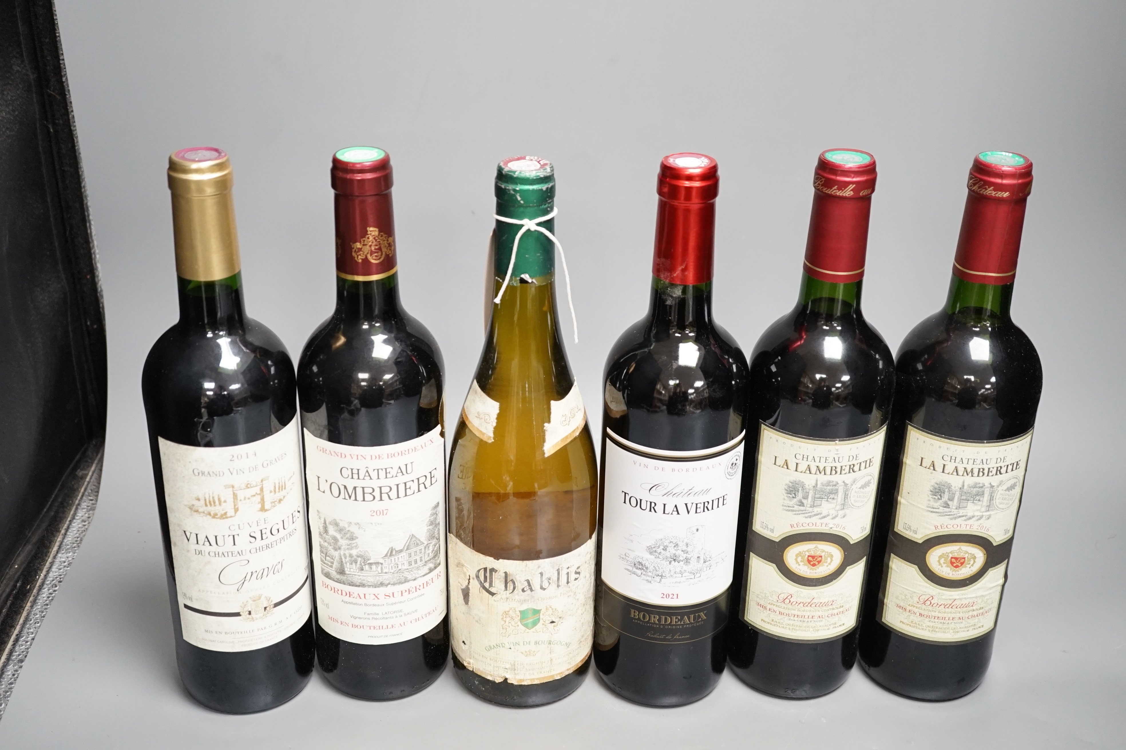 Five bottles of Bordeaux and one Chablis